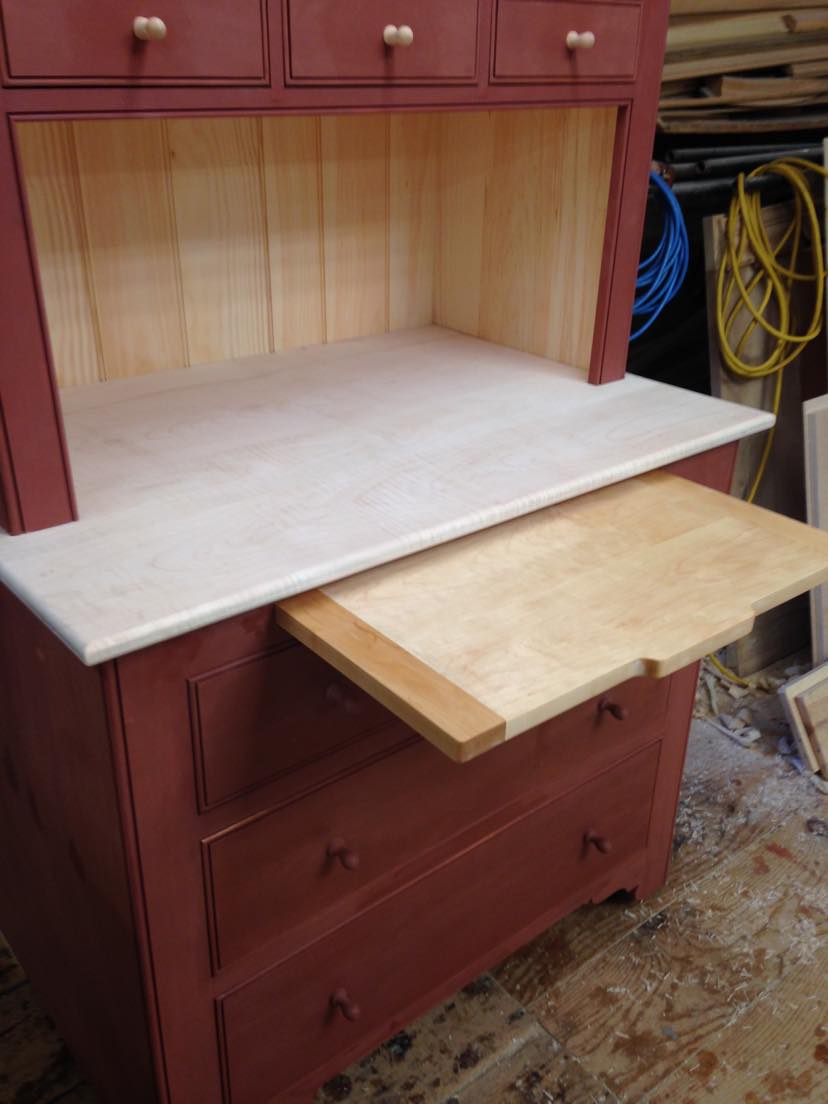 Slant front breakfront — detail of hand-cut joinery and moulding profiles