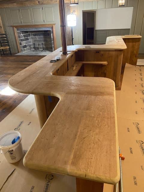 Finished curved bar cabinet door and hardware detail