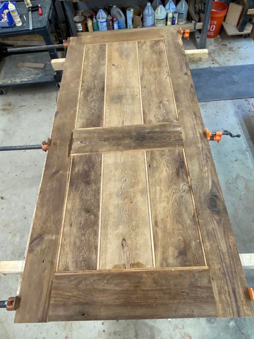 Long countertop with cabinet base, shop floor