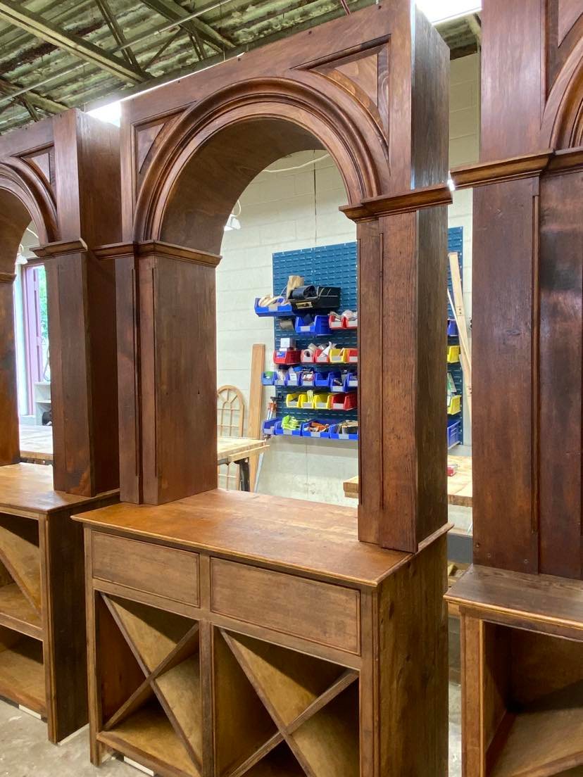 Multiple arched-door cupboard frames assembled