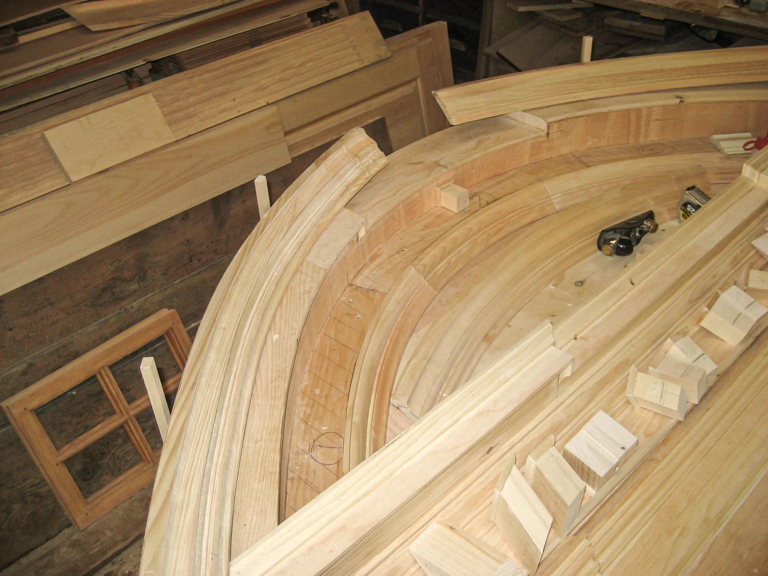 Archtop assembly from above showing curved members and joinery