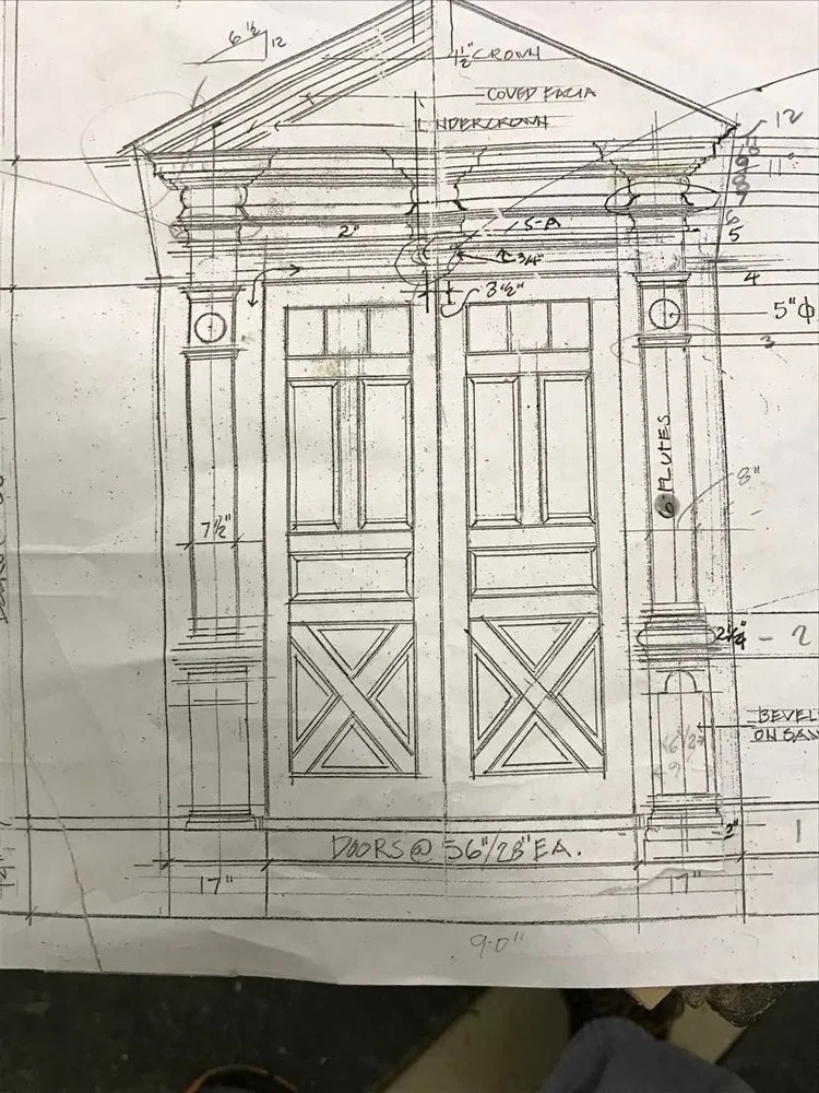 Architectural pencil sketch and elevation drawing of triangular pediment entryway