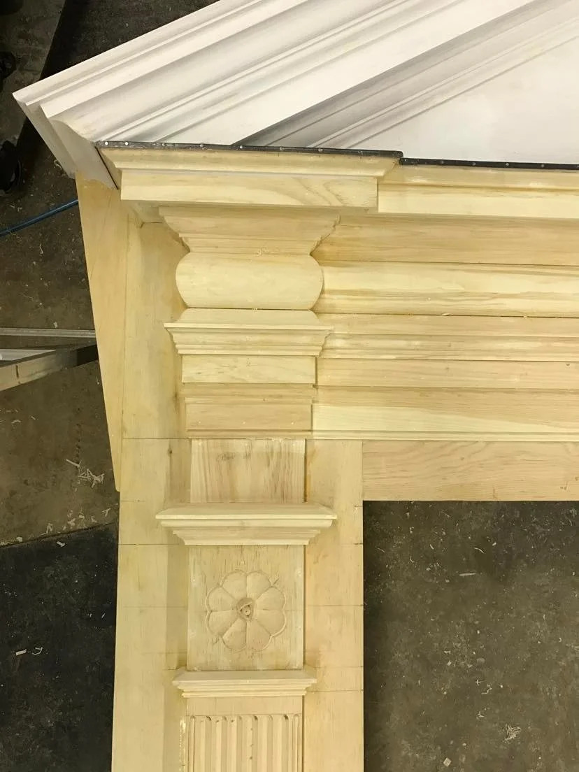 Fluted pilaster detail, raw wood, close-up of column profile