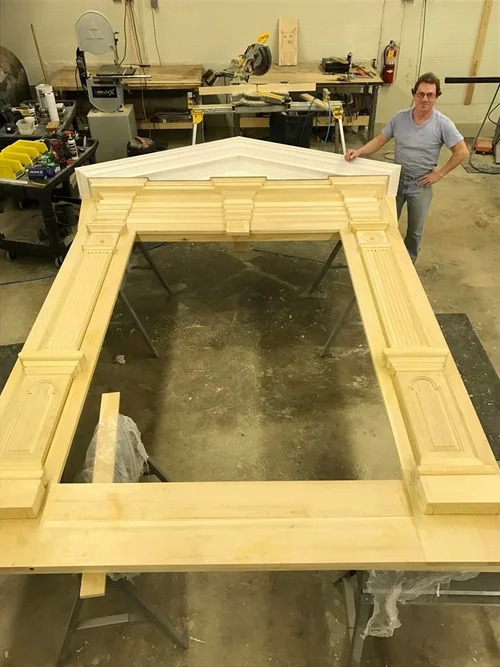 Completed raking cornice and pediment top, raw wood