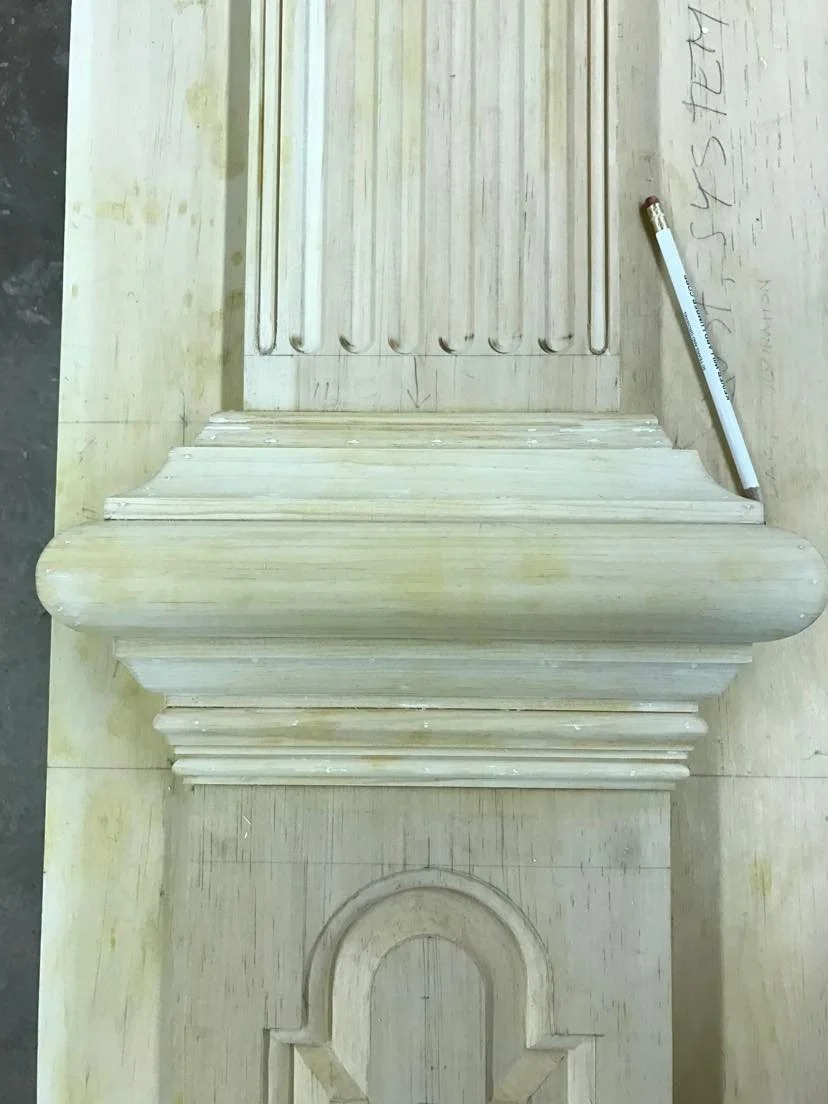 White painted complex ogee crown moulding, corner detail looking up