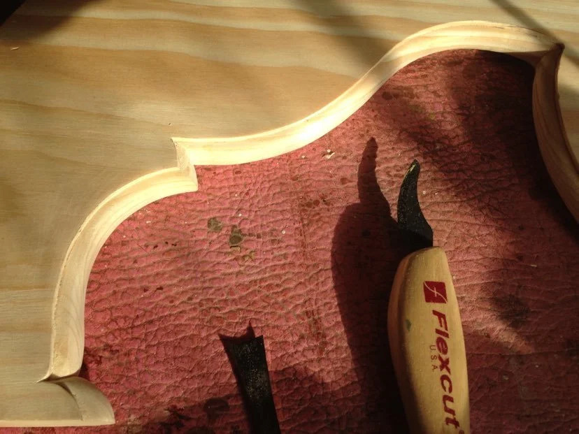 Yellow pine bed moulding stacked profiles close-up, natural finish