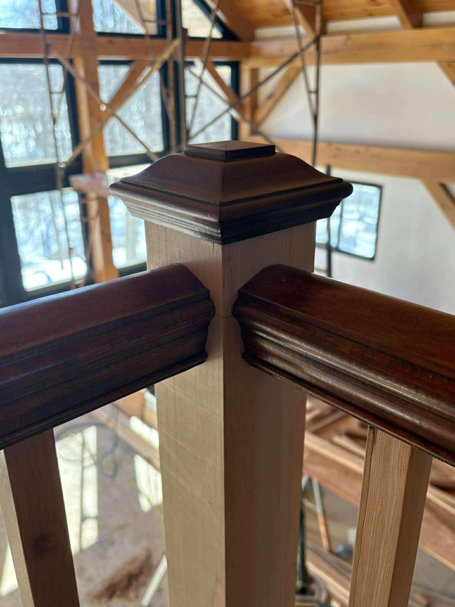 Baluster bottom rail connection detail, cherry and dark stain finish