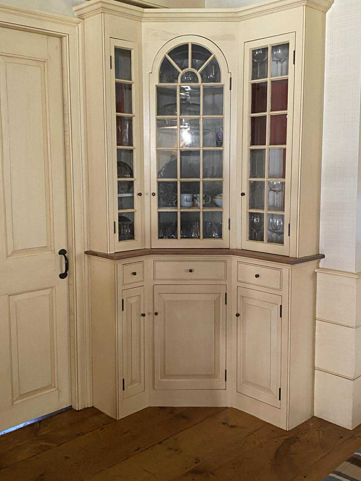 Antique wood knee wall cabinetry detail